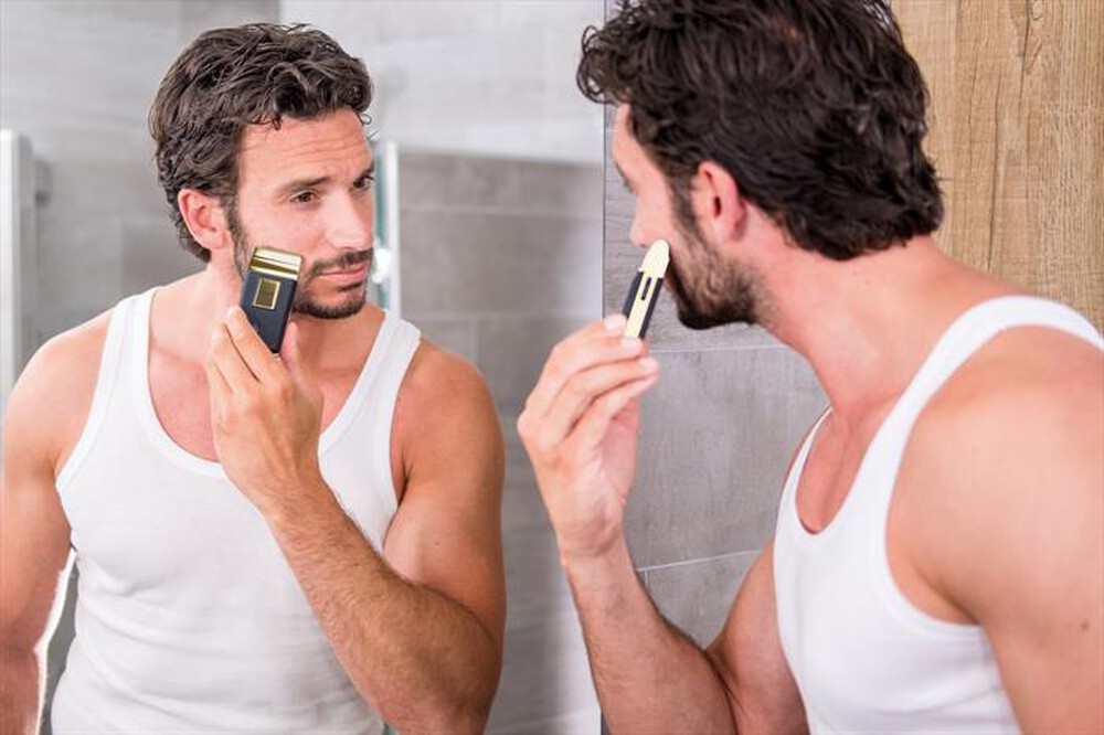 Immagine del prodotto WAHL - Rasoio ricaricabile TRAVEL SHAVER-Nero/Oro