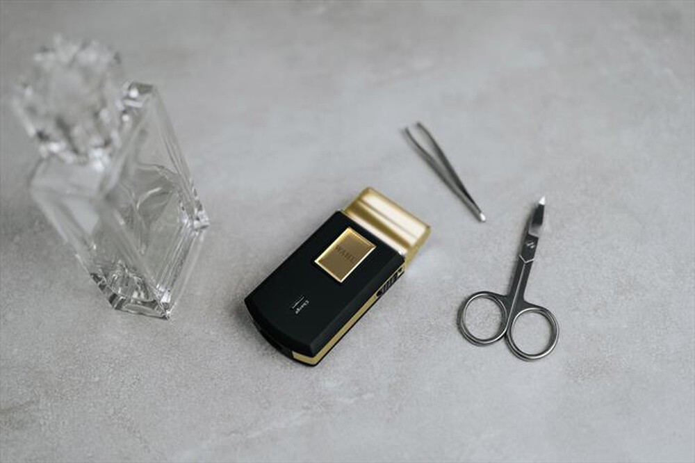 Immagine del prodotto WAHL - Rasoio ricaricabile TRAVEL SHAVER-Nero/Oro